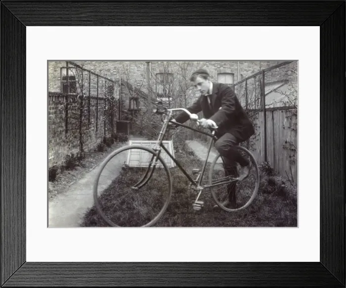 Framed Print : Boy getting on to his new Bicycle Framed Print : Boy getting on to his new Bicycle