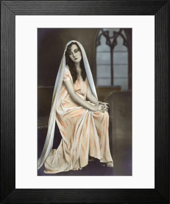 Framed Print : Glamorous French beauty in pious pose Framed Print : Glamorous French beauty in pious pose