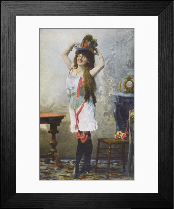 Framed Print : Jolly French beauty trying on her new hat Framed Print : Jolly French beauty trying on her new hat