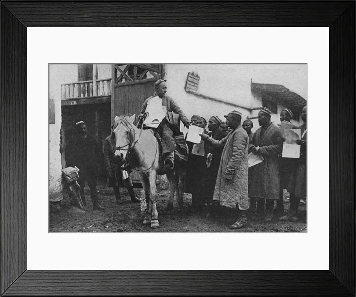 Framed Print : Ukbekistan - Mail Carrier distributing newspapers Framed Print : Ukbekistan - Mail Carrier distributing newspapers