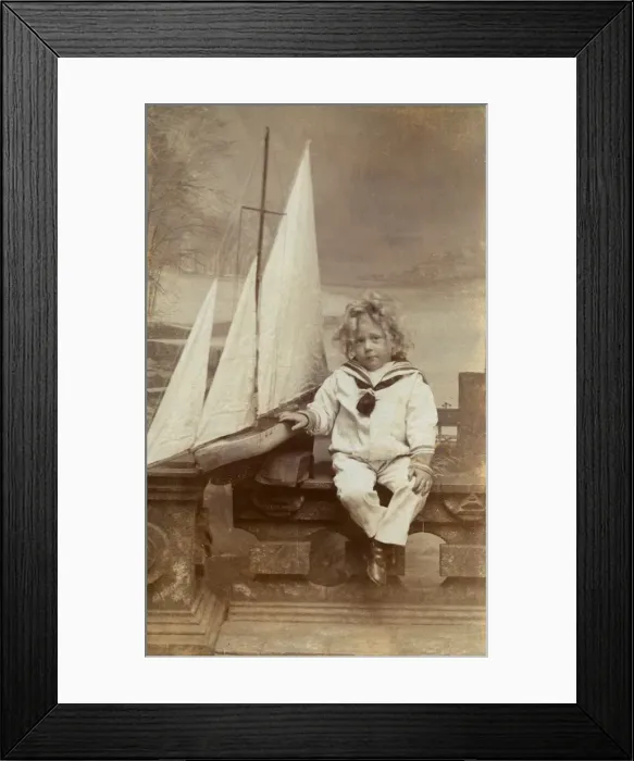 Framed Print : Little boy in his sailor suit with his toy boat Framed Print : Little boy in his sailor suit with his toy boat