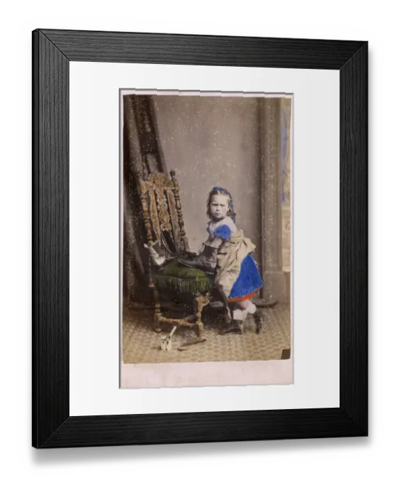 Framed Print : Little girl polishing her Fathers boots - studio portrait Framed Print : Little girl polishing her Fathers boots - studio portrait