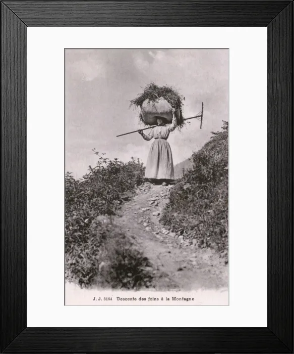 Framed Print : Woman descending a mountain path - Switzerland Framed Print : Woman descending a mountain path - Switzerland