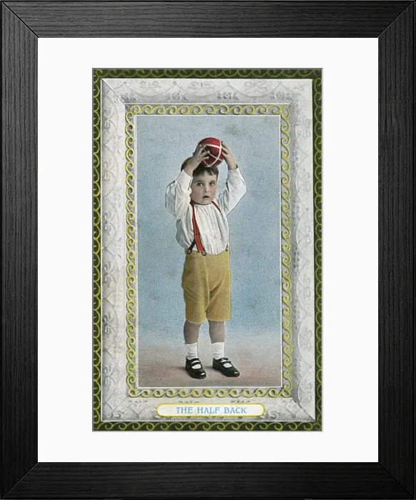 Framed Print : The Half Back - A Young Footballer Framed Print : The Half Back - A Young Footballer