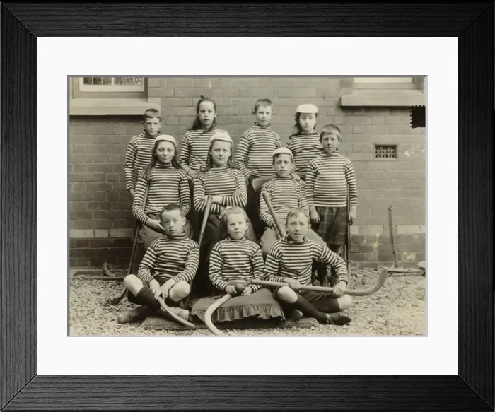 Framed Print : Childrens Mixed Hockey Team - London, late 19th century Framed Print : Childrens Mixed Hockey Team - London, late 19th century
