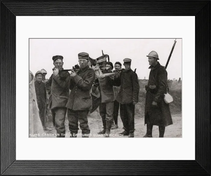 Framed Print : German prisoners made to carry their guns - WWI Framed Print : German prisoners made to carry their guns - WWI