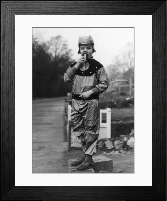 Framed Print : Young boy posing in his Christmas Martian Space Outfit Framed Print : Young boy posing in his Christmas Martian Space Outfit