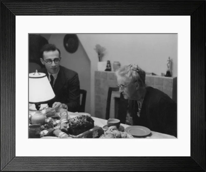 Framed Print : Grandma peering at the Christmas Cake - 1950s Framed Print : Grandma peering at the Christmas Cake - 1950s