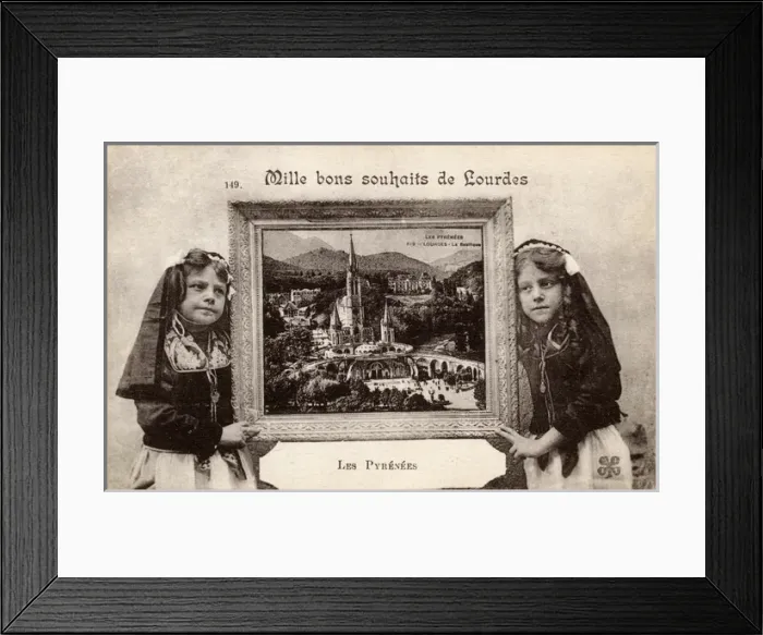 Framed Print : Two girls hold a picture of Lourdes, Pyrenees, France Framed Print : Two girls hold a picture of Lourdes, Pyrenees, France