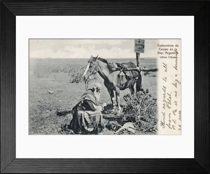 Framed Print : Argentinian traveller paying respects at grave of a gaucho Framed Print : Argentinian traveller paying respects at grave of a gaucho