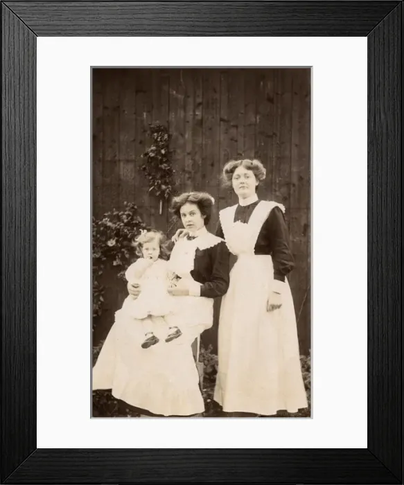 Framed Print : Two Housemaids and toddler - Edwardian England Framed Print : Two Housemaids and toddler - Edwardian England
