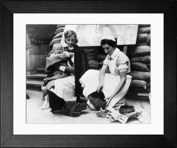 Framed Print : Nurses from Great Ormond Street Hospital examine bomb Framed Print : Nurses from Great Ormond Street Hospital examine bomb