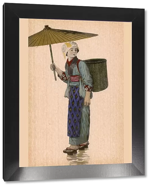 Japan - Japanese woman with umbrella and basket backpack