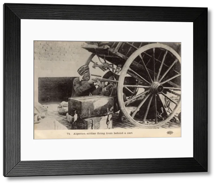 Framed Print : Two Algerian soldiers firing from behind the cover of a cart Framed Print : Two Algerian soldiers firing from behind the cover of a cart