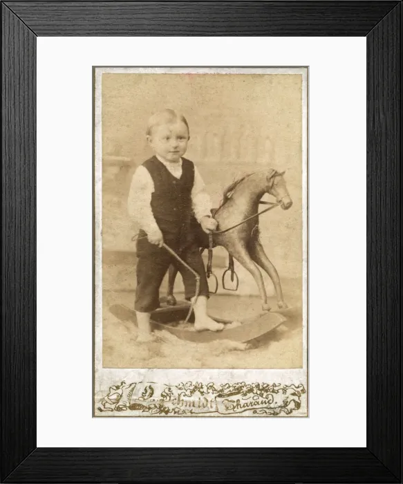Framed Print : Young German boy with rocking horse and whip Framed Print : Young German boy with rocking horse and whip