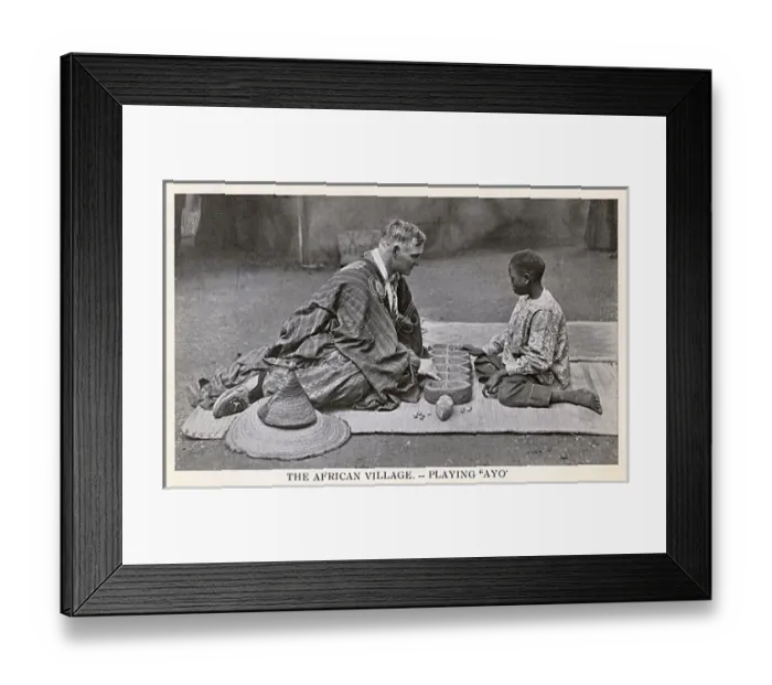 Framed Print : South Africa - European man and local boy play a game of Ayo Framed Print : South Africa - European man and local boy play a game of Ayo