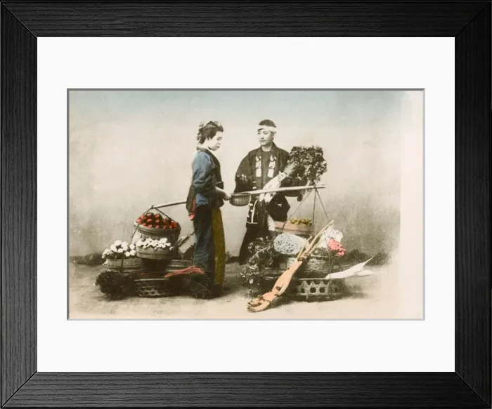 Framed Print : Japan - Woman buying food from a street vendor Framed Print : Japan - Woman buying food from a street vendor