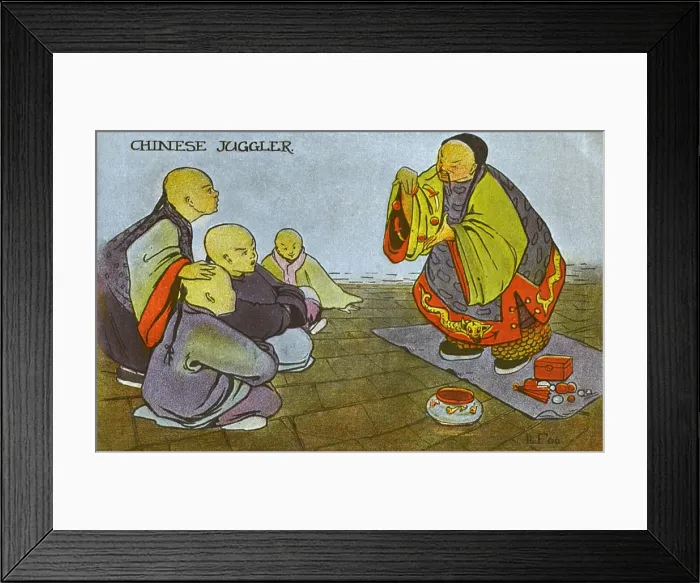 Framed Print : China - A Chinese Juggler amazes a group of young boys Framed Print : China - A Chinese Juggler amazes a group of young boys
