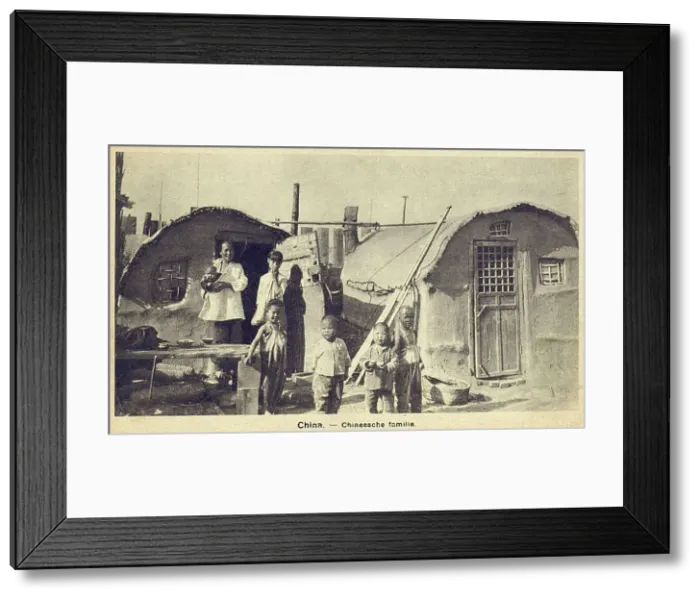 Framed Print : China - Poor Chinese family in simple small dwellings Framed Print : China - Poor Chinese family in simple small dwellings