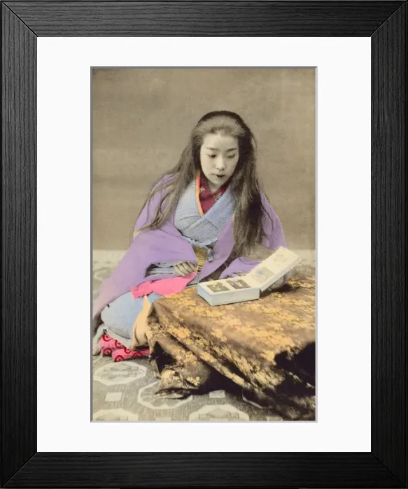 Framed Print : China - Chinese Girl flicking through a Photo Album Framed Print : China - Chinese Girl flicking through a Photo Album