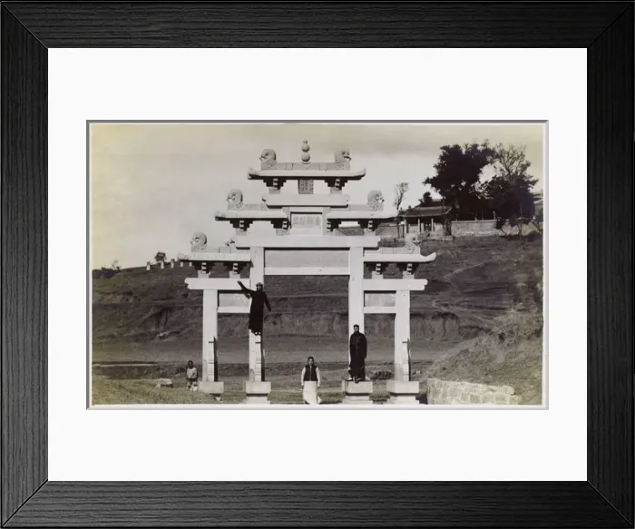 Framed Print : Chinese men fooling about on a Paifang Gateway, China Framed Print : Chinese men fooling about on a Paifang Gateway, China