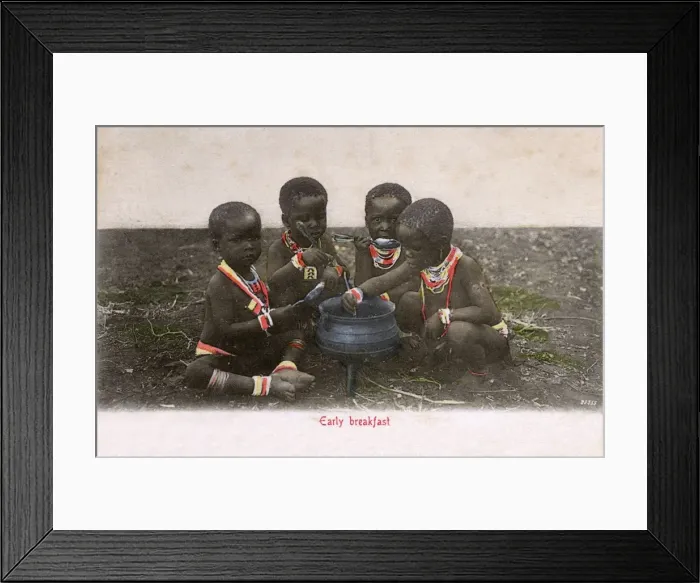 Framed Print : Four young Zulu children enjoy an early breakfast Framed Print : Four young Zulu children enjoy an early breakfast