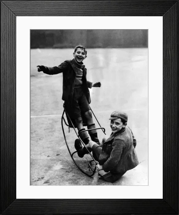 Framed Print : WW2 - Home Front - Two boys playing on a see saw Framed Print : WW2 - Home Front - Two boys playing on a see saw