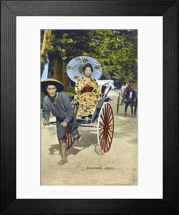 Framed Print : Japanese Woman with paper umbrella transported by Rickshaw Framed Print : Japanese Woman with paper umbrella transported by Rickshaw