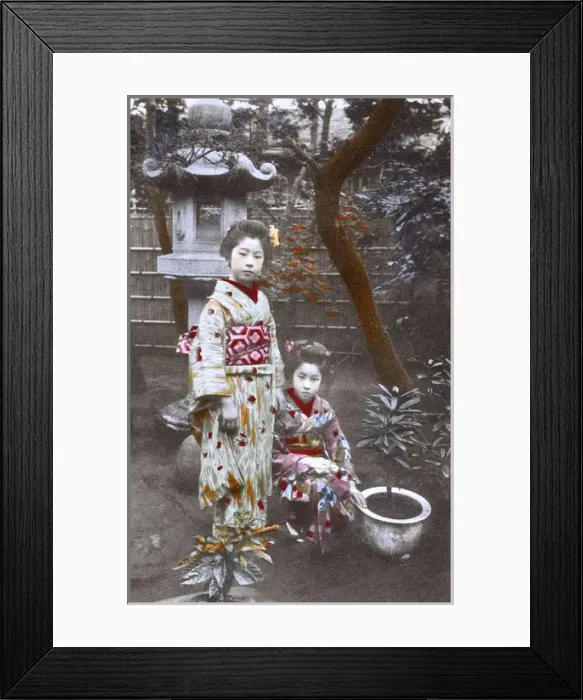 Framed Print : Japan - Two Geisha Girls - posing in an ornamental garden Framed Print : Japan - Two Geisha Girls - posing in an ornamental garden