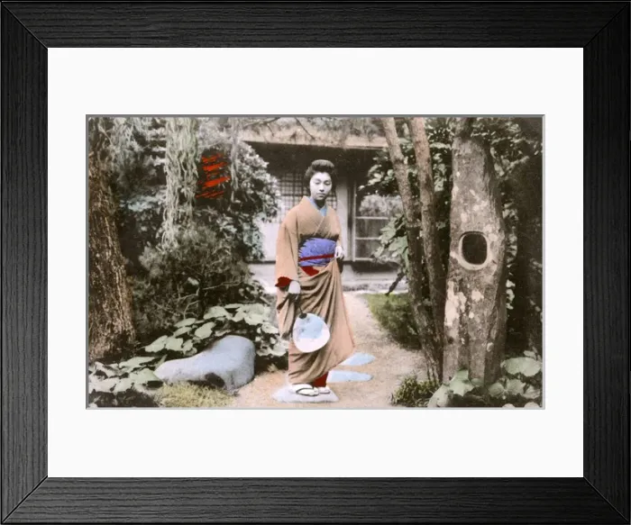 Framed Print : Japan - Woman ( boss at the tea house !) in garden with fan Framed Print : Japan - Woman ( boss at the tea house !) in garden with fan