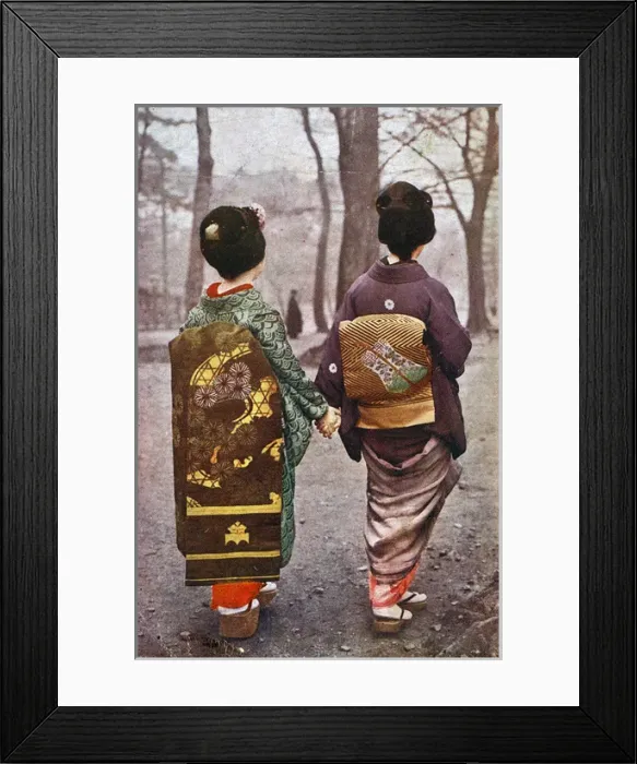 Framed Print : Two Japanese Geisha Girls walk hand in hand in the park Framed Print : Two Japanese Geisha Girls walk hand in hand in the park