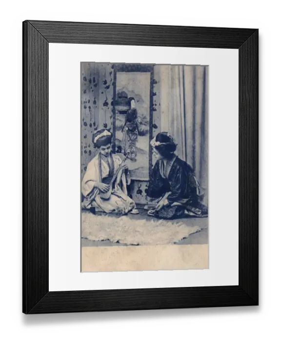 Framed Print : Two European girls dressed as Geishas playing music Framed Print : Two European girls dressed as Geishas playing music