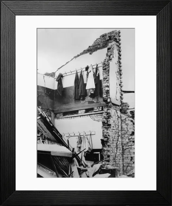 Framed Print : WW2 - Bomb Damage in London - Coats and Hats left on hooks Framed Print : WW2 - Bomb Damage in London - Coats and Hats left on hooks