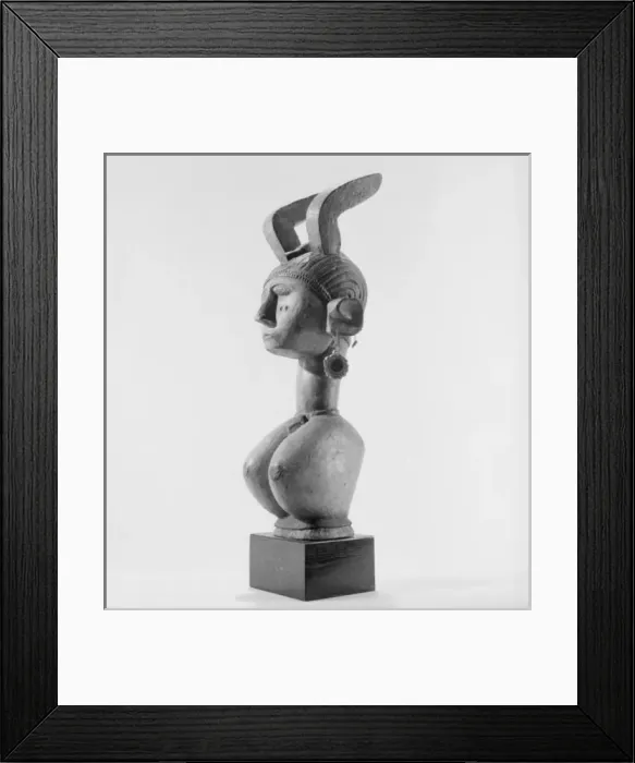 Framed Print : A Mounted African Wooden carving Framed Print : A Mounted African Wooden carving