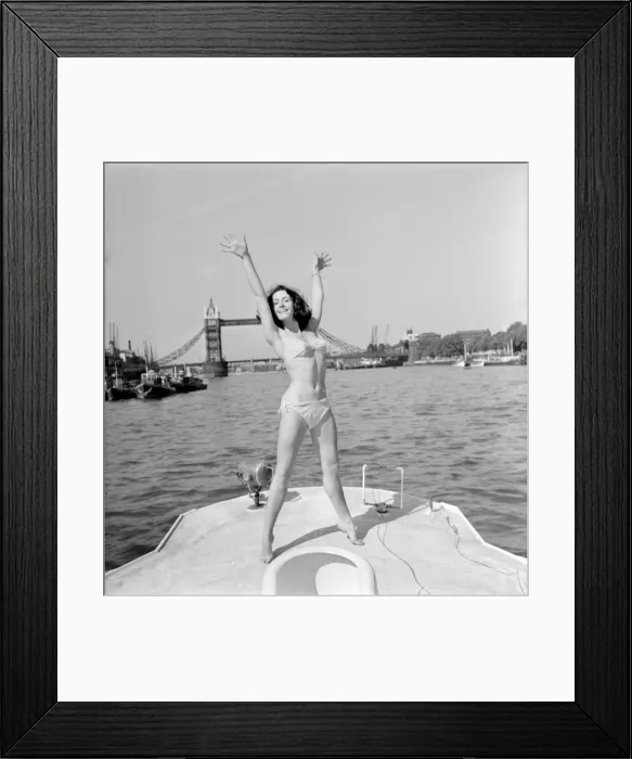 Framed Print : Young woman modelling on a boat Framed Print : Young woman modelling on a boat