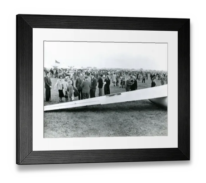 Framed Print : Spectators in front of the wing of a Sky Sailplane at th? Framed Print : Spectators in front of the wing of a Sky Sailplane at th?