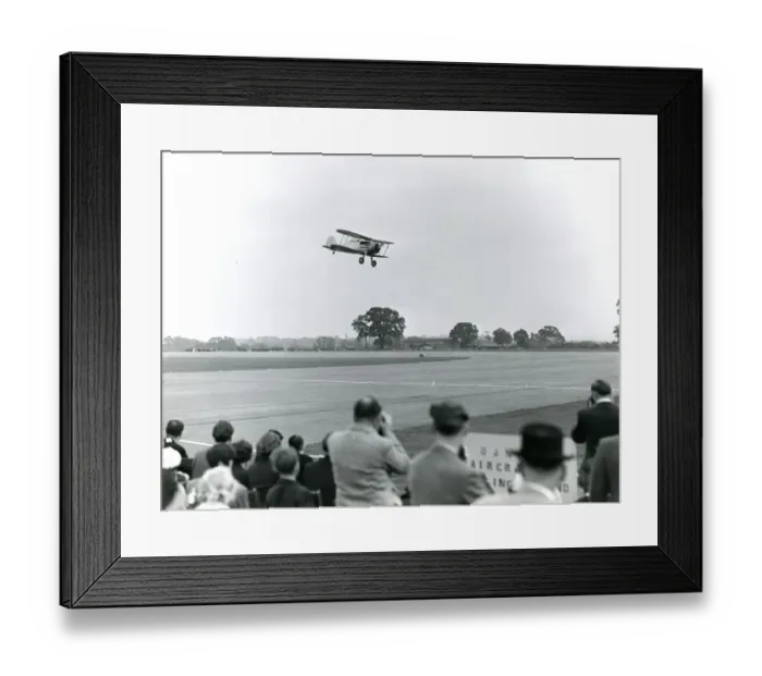 Framed Print : Gloster Gladiator, G-AMRK, gives a low flypast at the 19? Framed Print : Gloster Gladiator, G-AMRK, gives a low flypast at the 19?