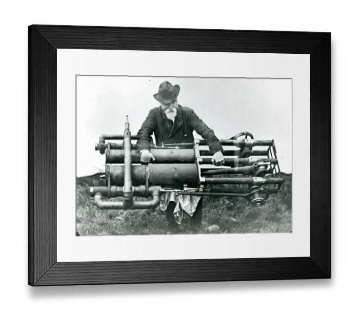 Framed Print : Sir Hiram Maxim in 1894 with one of the two steam engine? Framed Print : Sir Hiram Maxim in 1894 with one of the two steam engine?