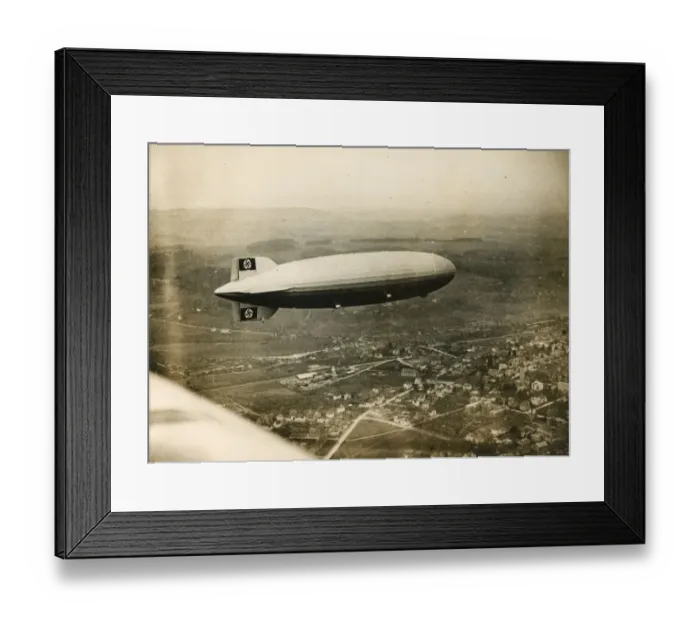 Framed Print : The LZ129 Hindenburg over Friedrichshafen during a test ? Framed Print : The LZ129 Hindenburg over Friedrichshafen during a test ?