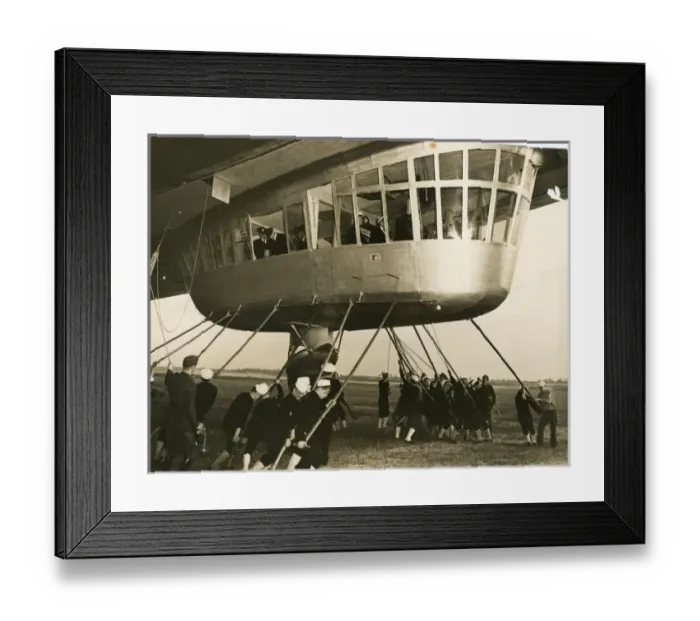 Framed Print : The LZ129 Hindenburg is manoeuvred to its mobile mooring? Framed Print : The LZ129 Hindenburg is manoeuvred to its mobile mooring?