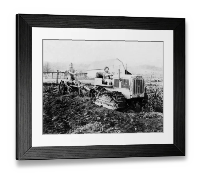 Framed Print : Girl Driving a Tractor Framed Print : Girl Driving a Tractor