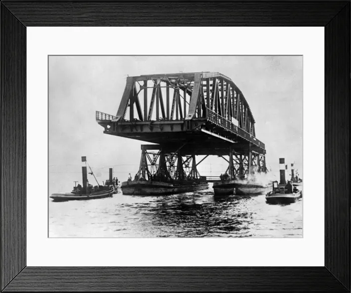 Framed Print : Ferrying a New Bridge Framed Print : Ferrying a New Bridge