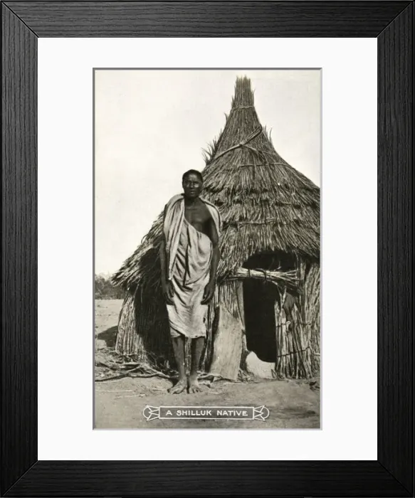 Framed Print : Sudan - A Shilluk man outside his house Framed Print : Sudan - A Shilluk man outside his house