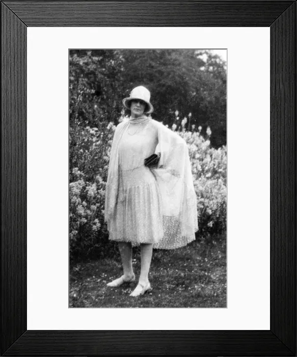 Framed Print : Fashionable lady posing in garden Framed Print : Fashionable lady posing in garden