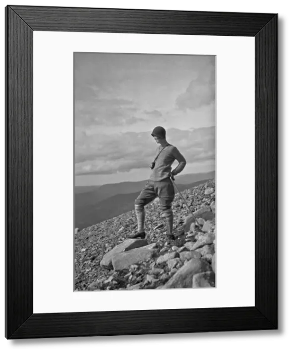 Framed Print : Woman out walking, Portree, Isle of Skye, Scotland Framed Print : Woman out walking, Portree, Isle of Skye, Scotland