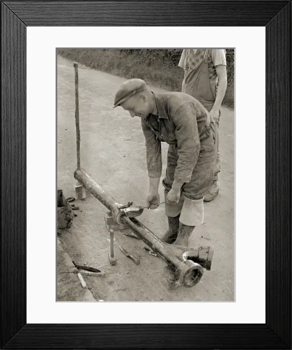 Framed Print : Man at work on a country road Framed Print : Man at work on a country road