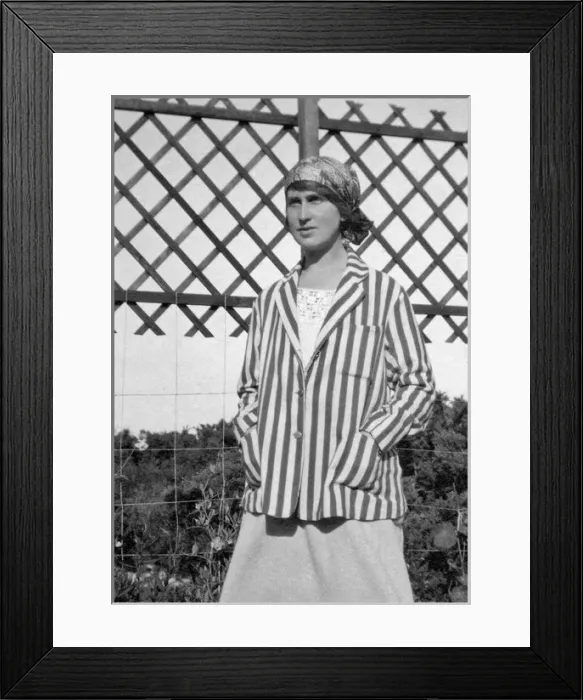 Framed Print : Young woman in striped blazer Framed Print : Young woman in striped blazer