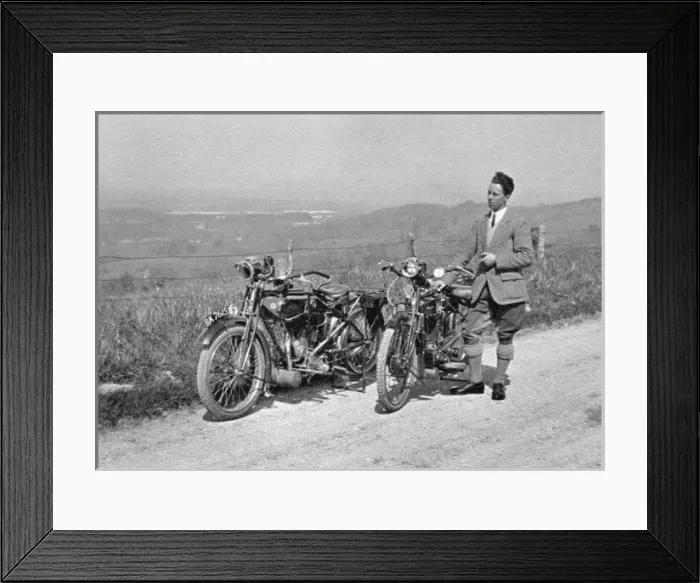 Framed Print : Man on country lane with two motorbikes Framed Print : Man on country lane with two motorbikes