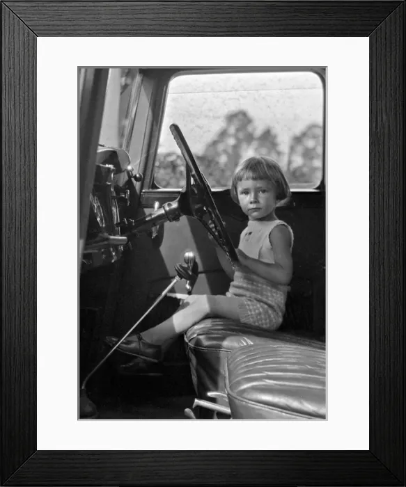 Framed Print : Little girl at the steering wheel Framed Print : Little girl at the steering wheel
