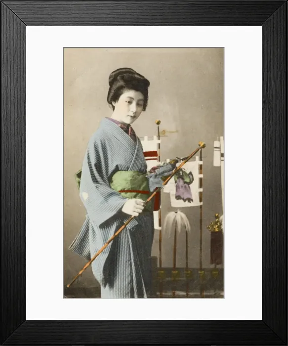 Framed Print : Geisha holding decorative fish flag Framed Print : Geisha holding decorative fish flag